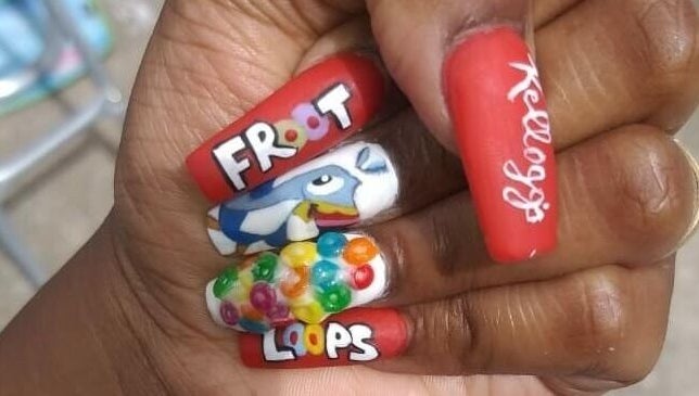 Creative nail art at Cialeyah Beauty Bar, St Peter’s, Sint Maarten, SX with colorful Froot Loops design.