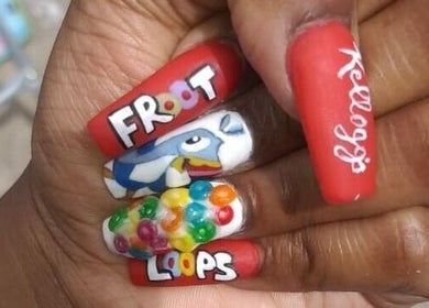 Creative nail art at Cialeyah Beauty Bar, St Peter’s, Sint Maarten, SX with colorful Froot Loops design.