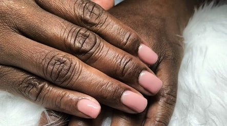 Elegant pink manicure at Cialeyah Beauty Bar in St Peter’s, Sint Maarten, SX. Perfectly polished nails shown.