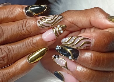 Stylish gold and black nail art at Cialeyah Beauty Bar, St Peter’s, Sint Maarten, SX.
