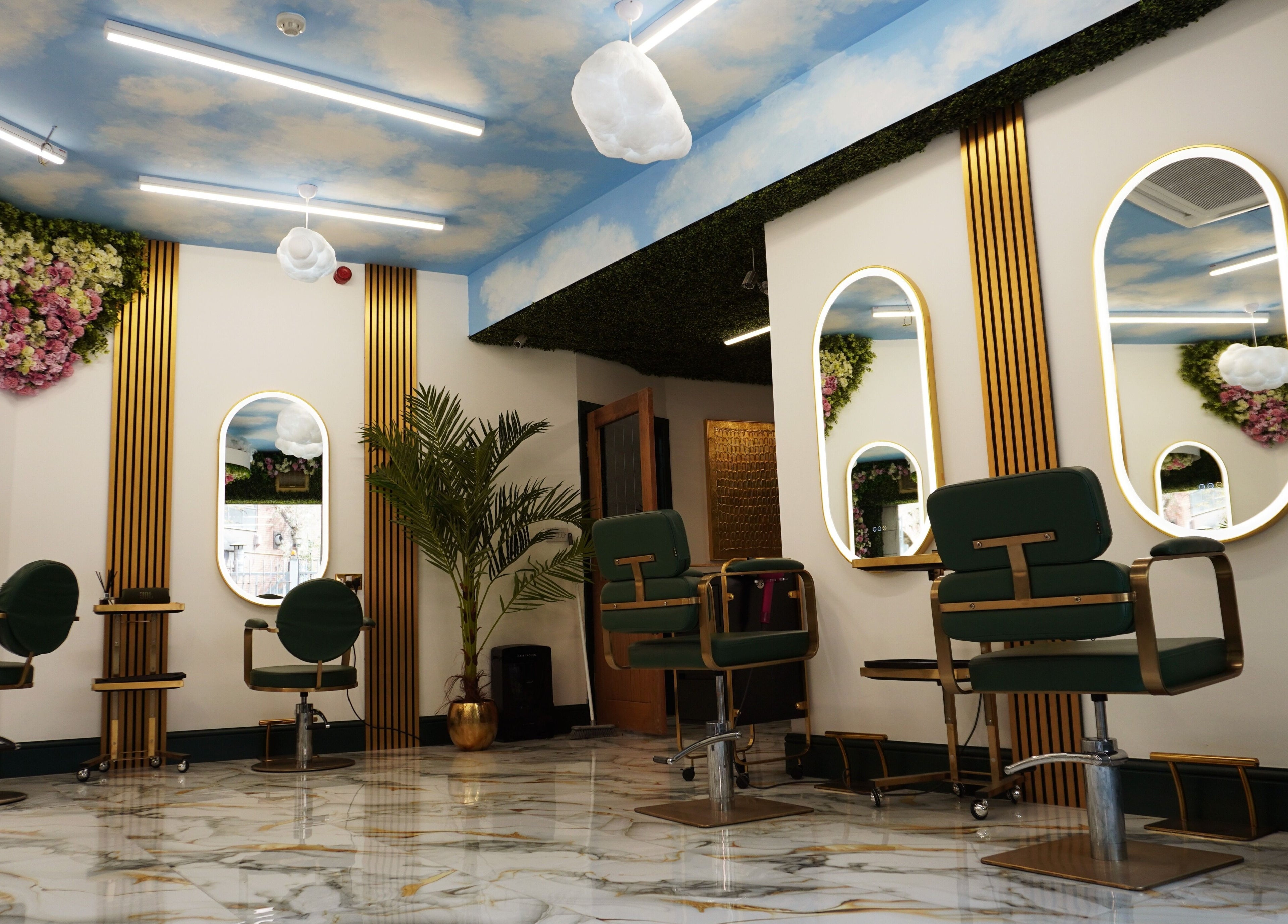 Elegant salon chairs and mirrors at Headhunters Salon Leeds (Academy), Leeds, England, GB.