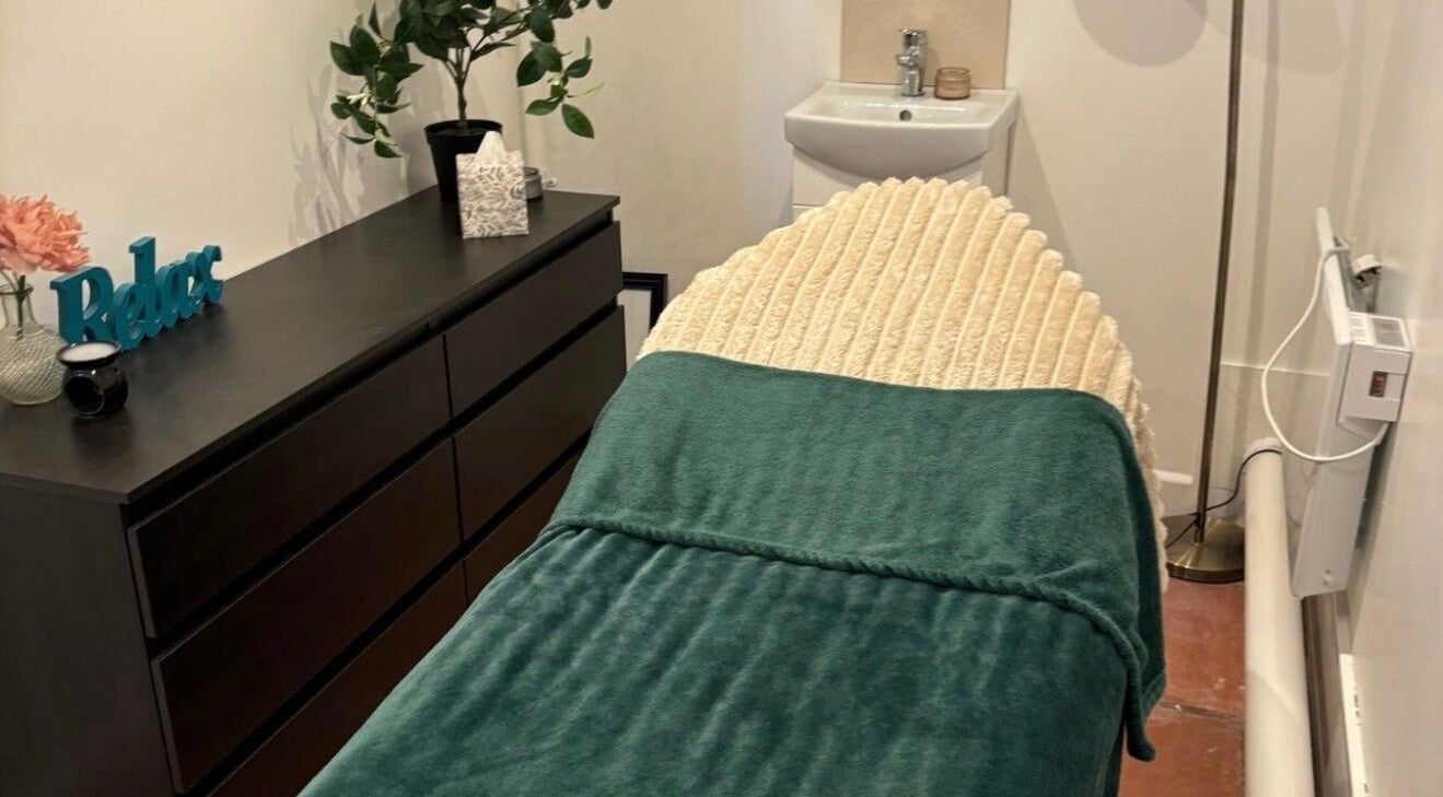 Relaxing treatment room at Yatton Beauty Room, Yatton, England with cozy bed and soothing decor.