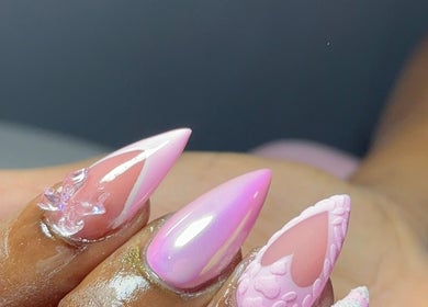 Close-up of intricate pink floral nail art at Pressed Nails, Bridgetown, Saint Michael, BB.