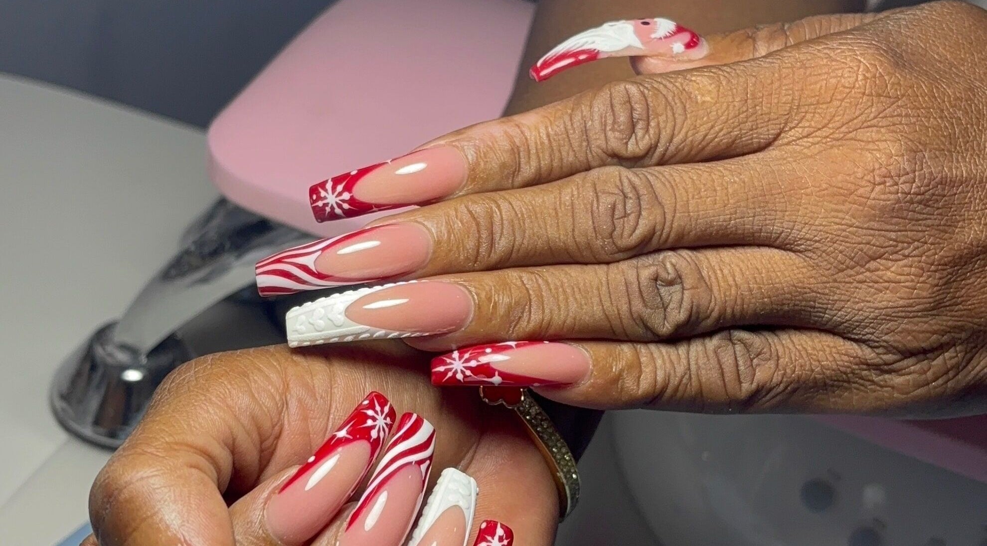 Intricate festive nail art at Pressed Nails, Bridgetown, Saint Michael, BB showcasing holiday elegance.