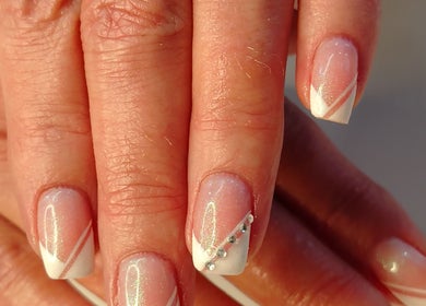 Close-up of elegant nail art with rhinestones at Lavi Beauty Clinic, Pretoria, Gauteng, ZA.