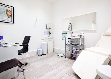 Modern treatment room at YSC Bournemouth & Online Clinic, Bournemouth, England, GB, with chairs and equipment.