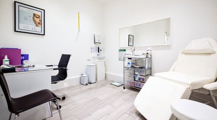 Modern treatment room at YSC Bournemouth & Online Clinic, Bournemouth, England, GB, with chairs and equipment.
