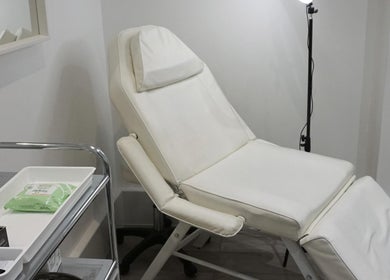 YSC Bournemouth & Online Clinic treatment room with reclining chair, Bournemouth, England, GB.