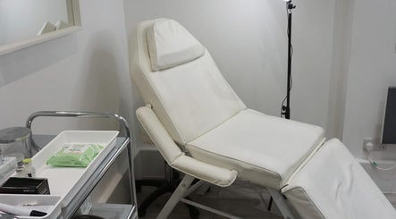 YSC Bournemouth & Online Clinic treatment room with reclining chair, Bournemouth, England, GB.