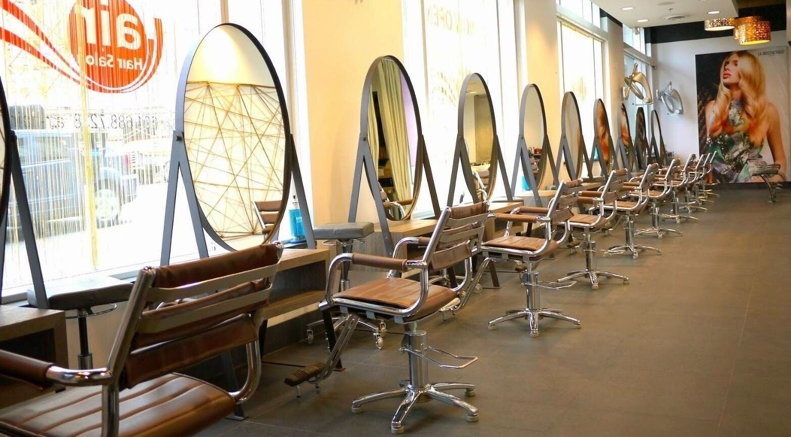 Interior of Air Hair Salon showing sleek styling chairs and mirrors in Vancouver, British Columbia, CA.