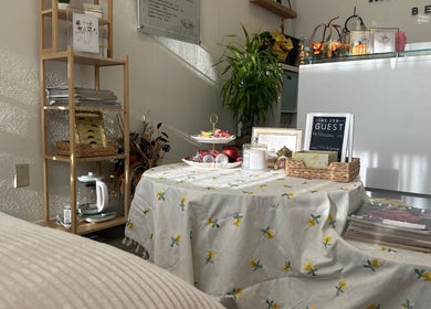 Cozy corner at Magiclash Brea in Brea, California, US with table and shelf for beauty and wellness ambiance.