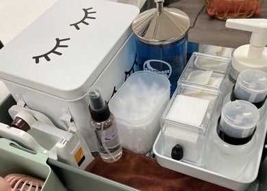 Beauty tools at Magiclash Brea, Brea, California, US, showcasing a well-organized cart with eyelash supplies.