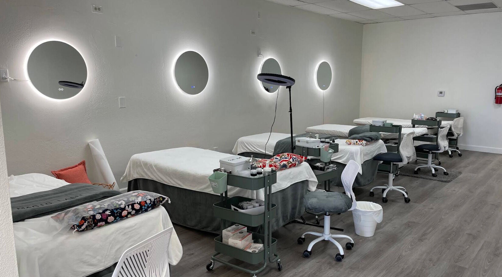 Magiclash Brea beauty studio with beds and elegant lighting in Brea, California, US.