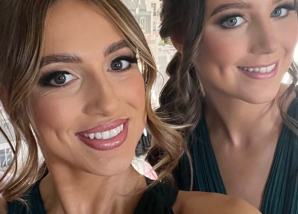 Two smiling women at The Tan Studio in Middlesbrough, England, GB showcasing flawless makeup.