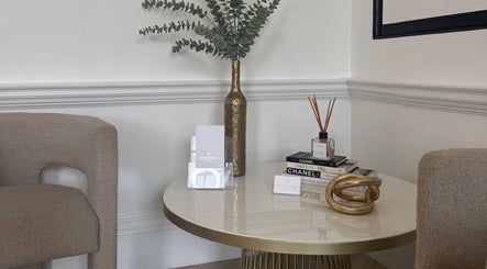 Stylish lounge at Brow Babes - BrowZ by Harry, Truro, England, GB with elegant decor and soft seating.