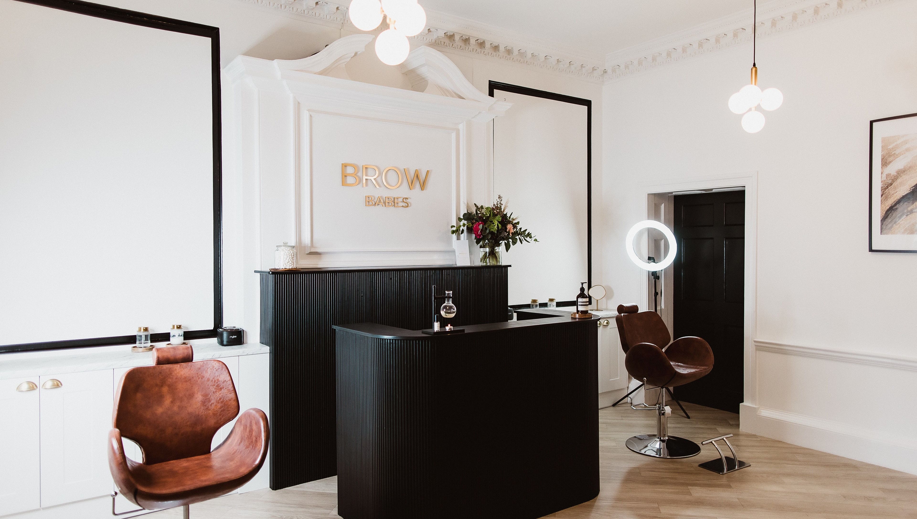 Interior of Brow Babes - Harry in Truro, England, GB, featuring elegant seating and modern decor.