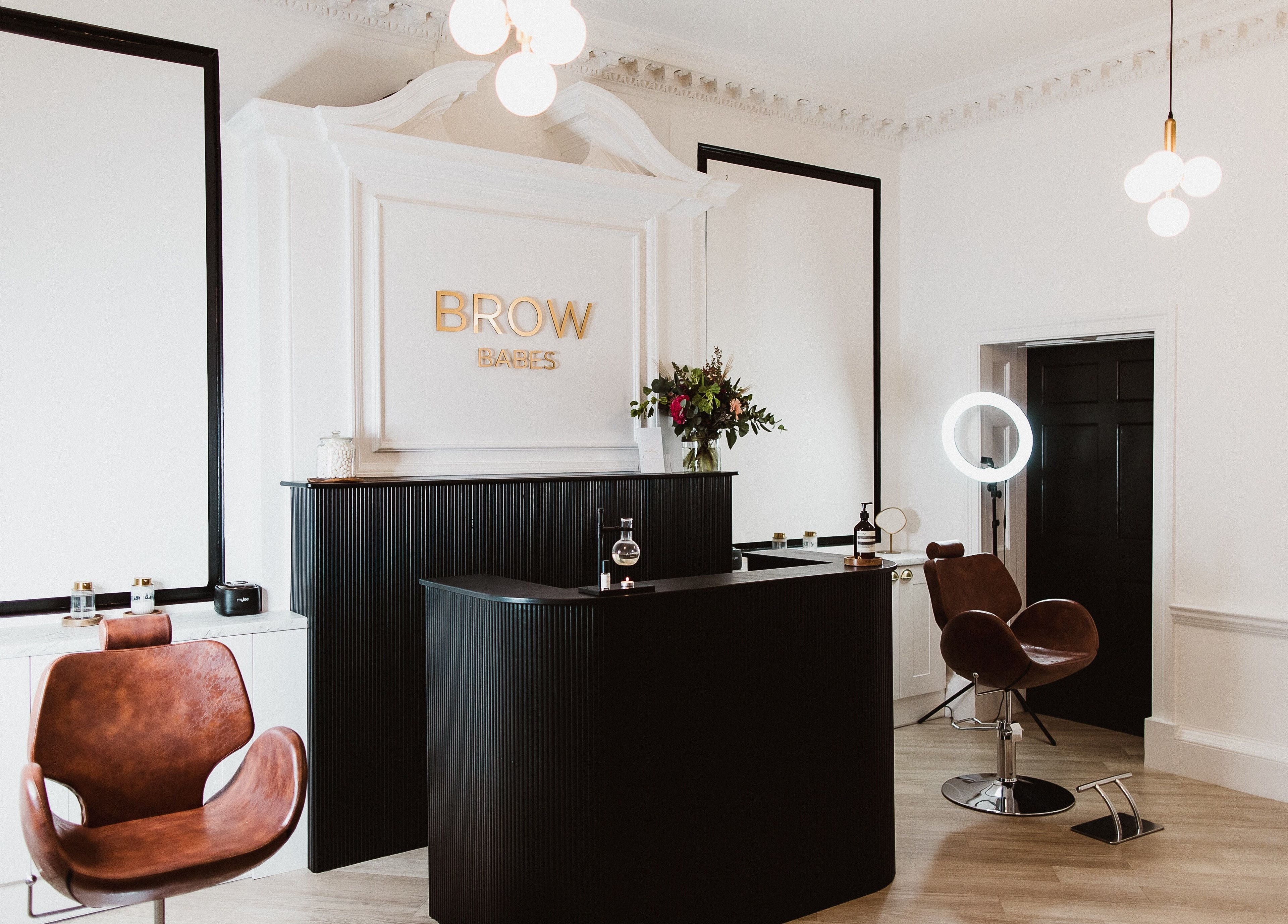 Interior of Brow Babes - Harry in Truro, England, GB, featuring elegant seating and modern decor.