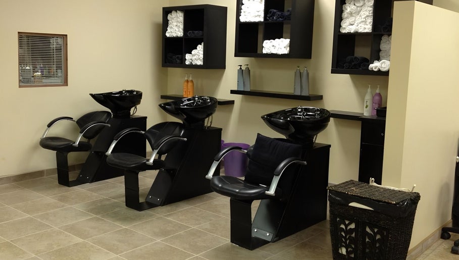 Modern wash stations at Hair Unlimited Salon in Jacksonville, Florida, US. Clean, inviting, and professional.