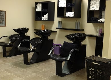 Modern wash stations at Hair Unlimited Salon in Jacksonville, Florida, US. Clean, inviting, and professional.
