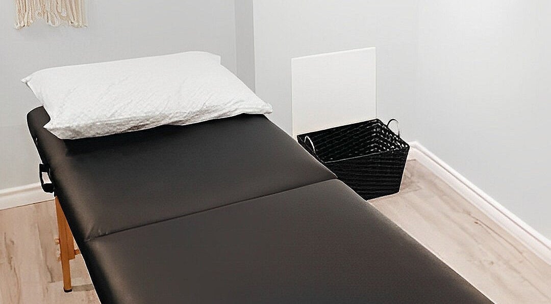 Relaxing treatment bed at Esthetics by Nikki, Hamilton, Ontario, CA, perfect for wellness and beauty sessions.
