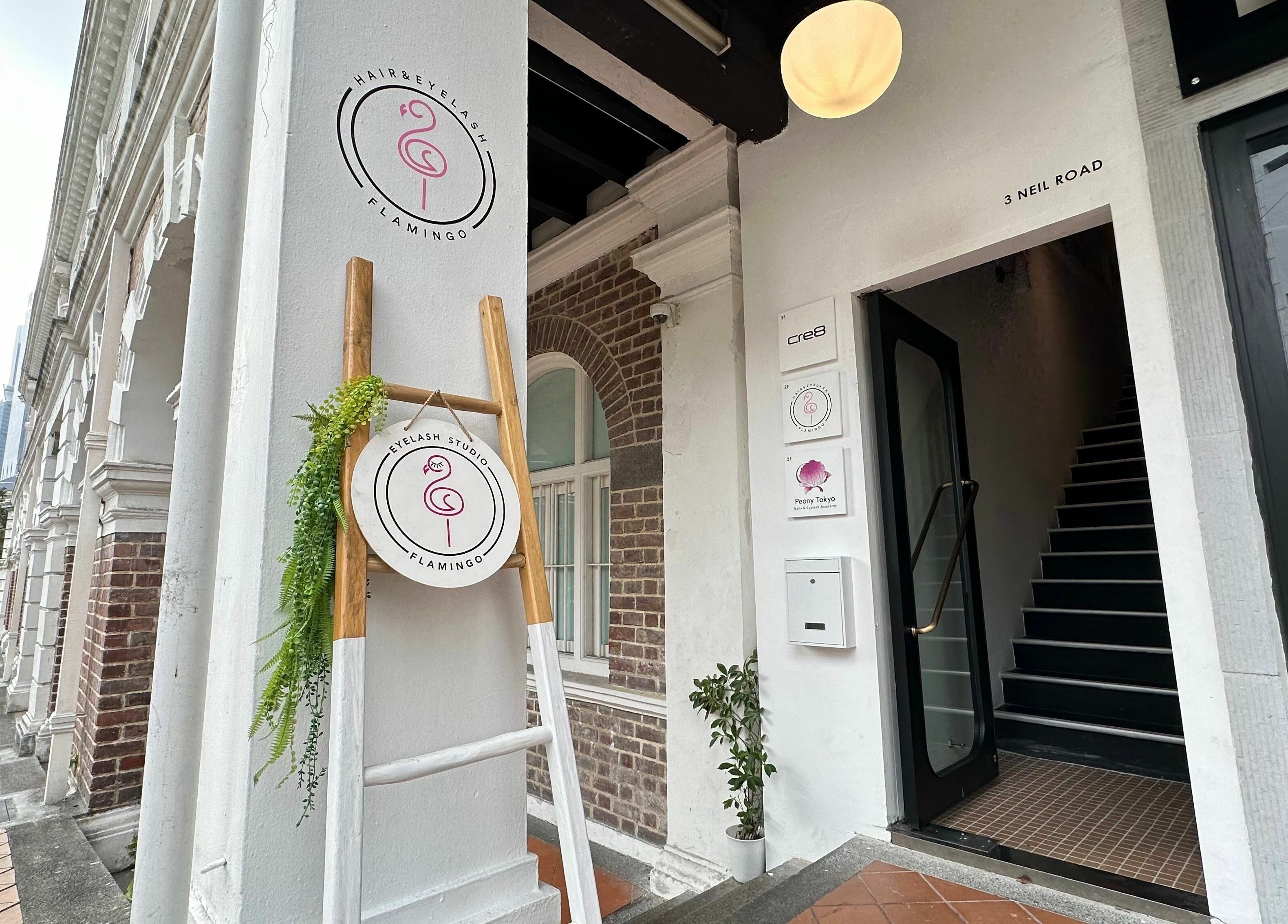 Entrance of Hairstudio Flamingo - Tanjong Pagar, Singapore, SG with signage and stairs.