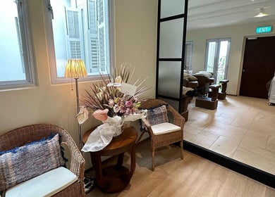 Cozy seating with floral decor at Eyelash Studio Flamingo - Tanjong Pagar, Singapore, Singapore, SG.