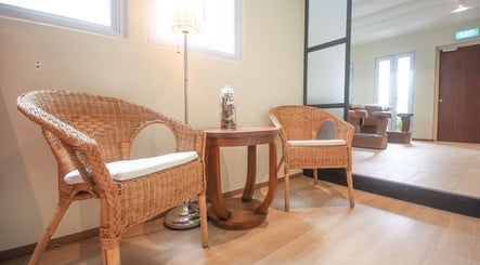 Cozy wicker chairs in Eyelash Studio Flamingo - Tanjong Pagar, Singapore, SG reception area.