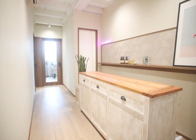 Reception area at Eyelash Studio Flamingo - Tanjong Pagar in Singapore, SG featuring art and decor.