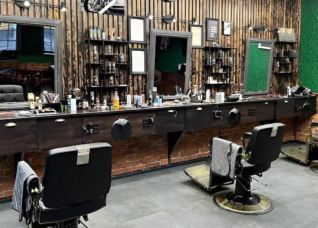 Interior of Alligator Barbers, Oslo, Oslo, NO. Stylish decor with grooming stations and mirrors.