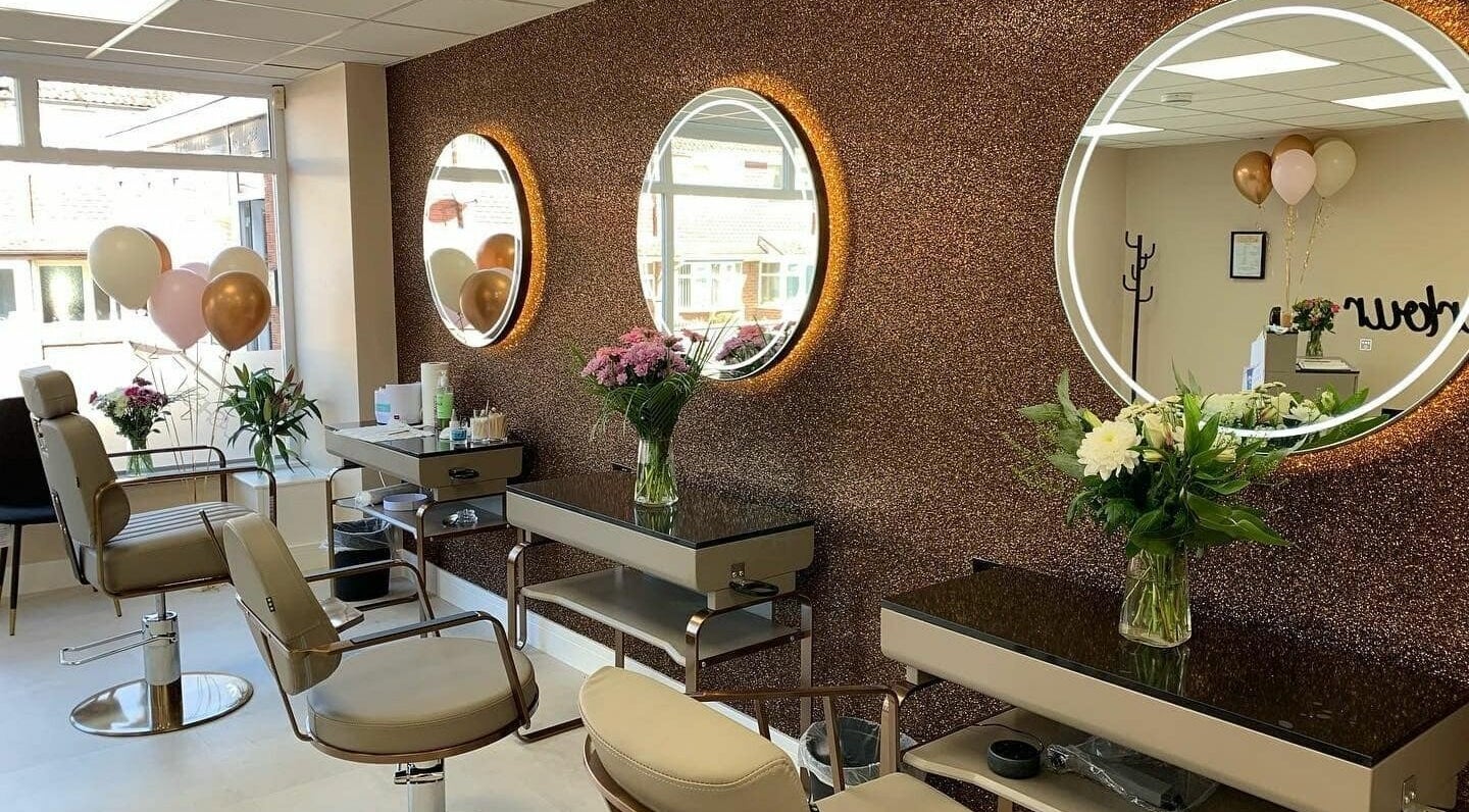 Kara's Beauty Parlour in Coventry, England, GB with elegant mirrors and plush chairs for a luxurious salon experience.