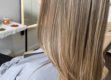 Sleek, straight hair styled by Team Lilian Sanchez in Katy, Texas, US, showcasing expert hair care.