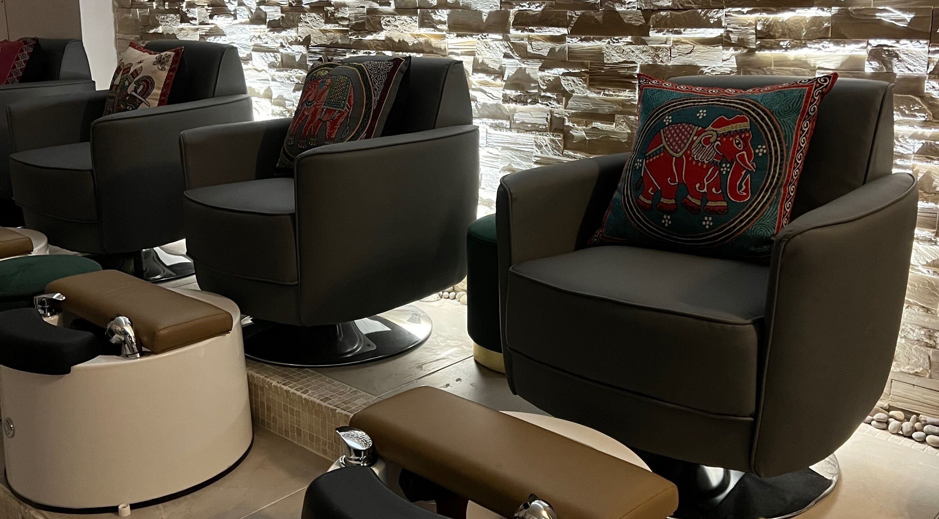 Luxurious pedicure chairs at Rose Nails in Barking, England, GB create a tranquil and stylish atmosphere.