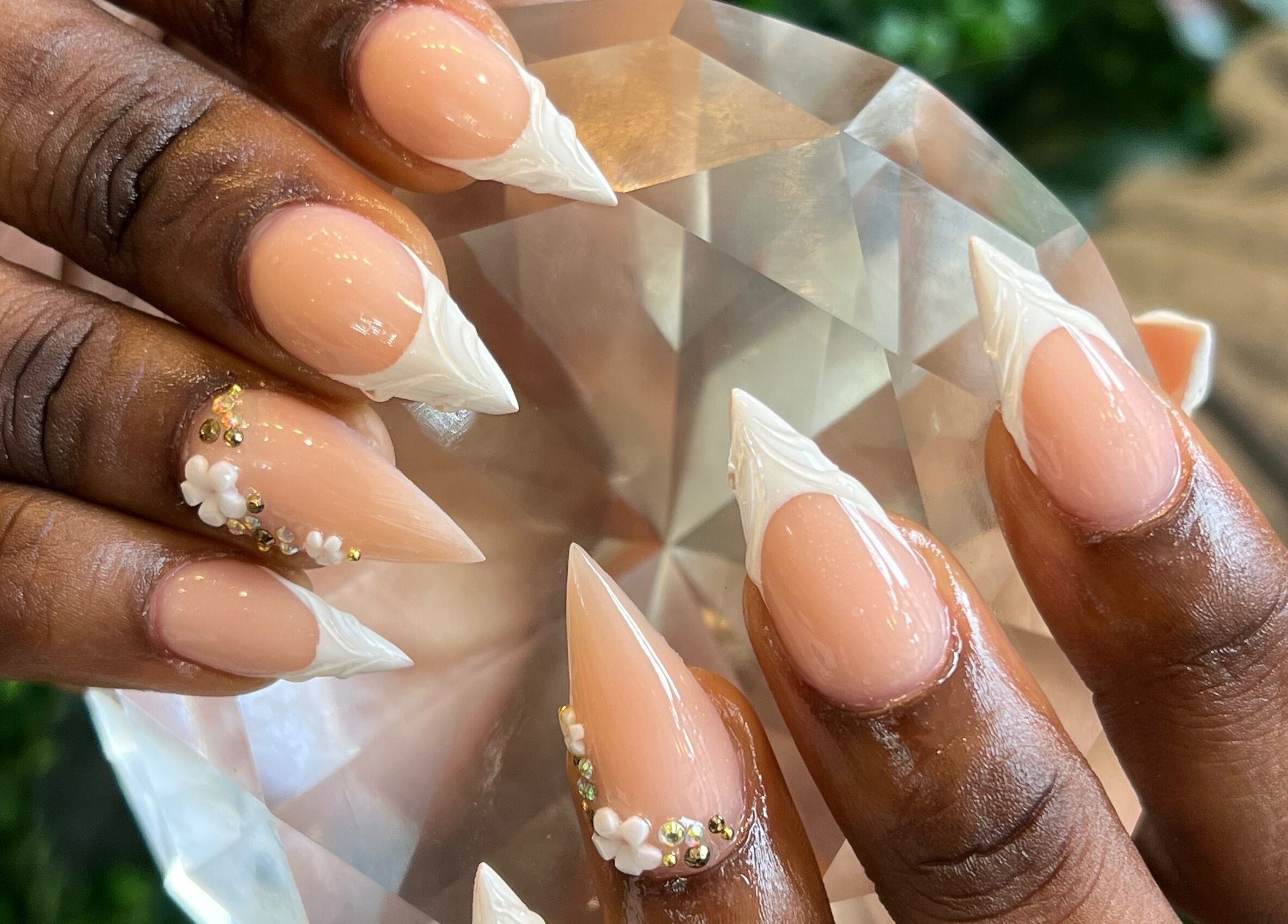 Intricate floral nail art with gemstones at Rose Nails, Barking, England, GB. Perfect for enhancing elegance.