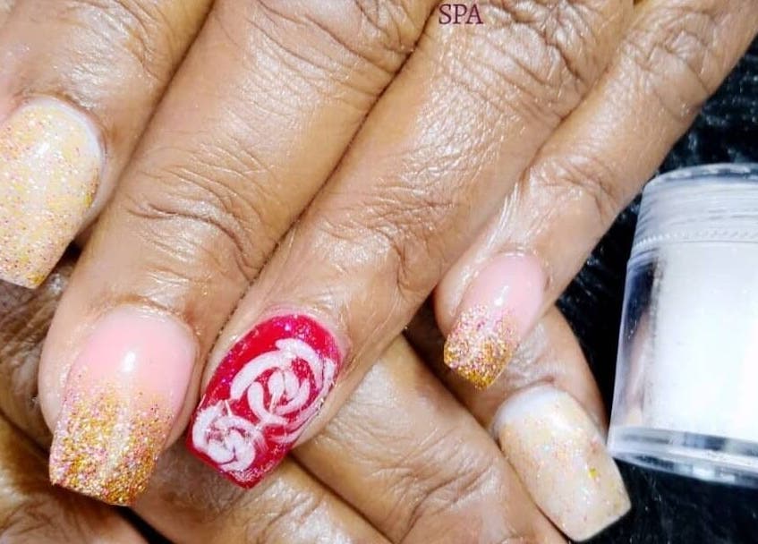 Elegant nail art with gold glitter and rose design at Passion Touches Spa, Bridgetown, Saint Michael, BB.