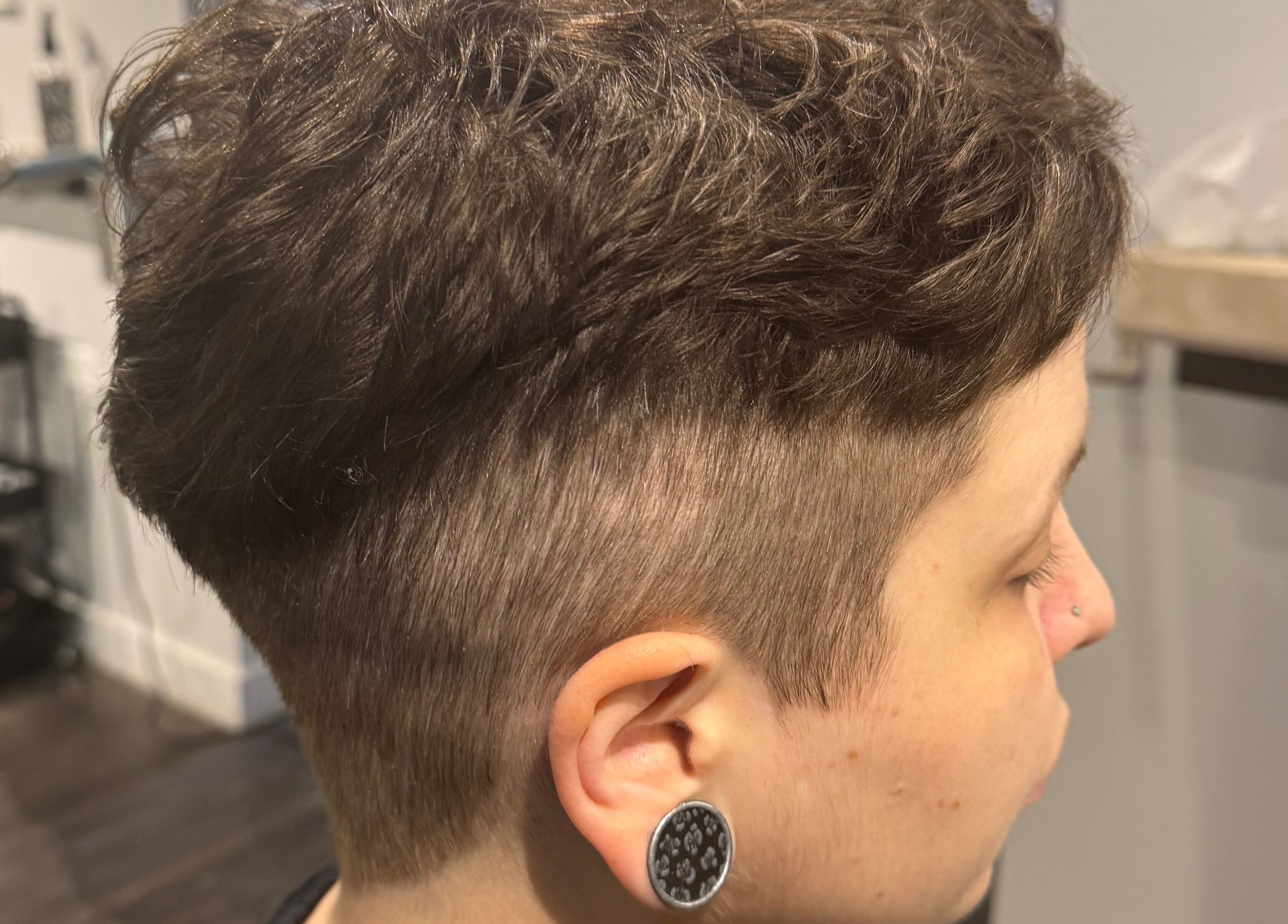 Stylish undercut haircut at Creative Look, 83 Sherbrook Street, Winnipeg, Manitoba, CA.