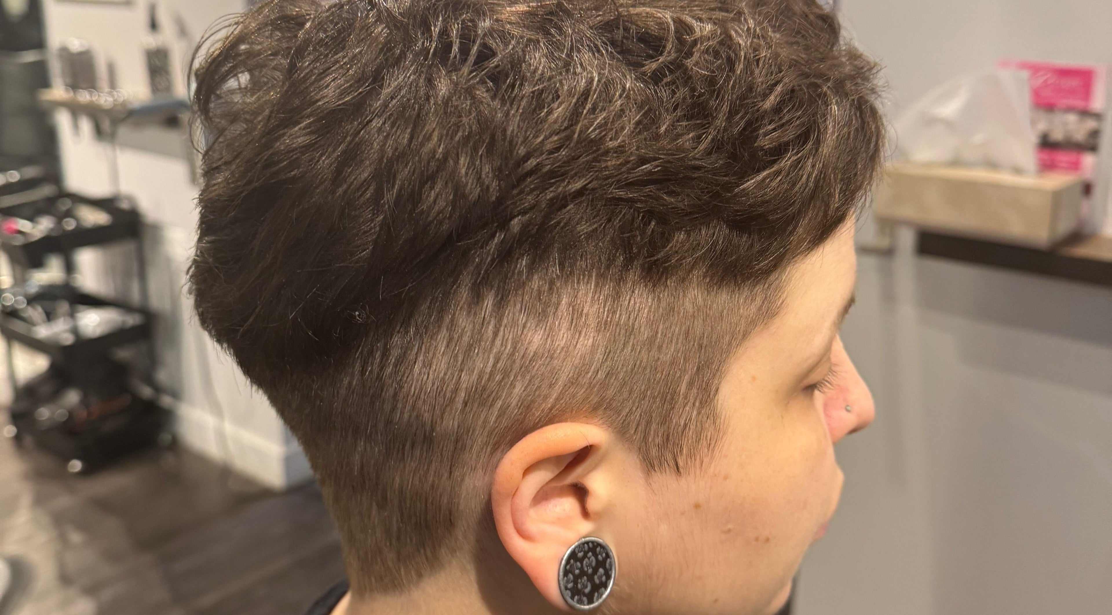 Stylish undercut haircut at Creative Look, 83 Sherbrook Street, Winnipeg, Manitoba, CA.