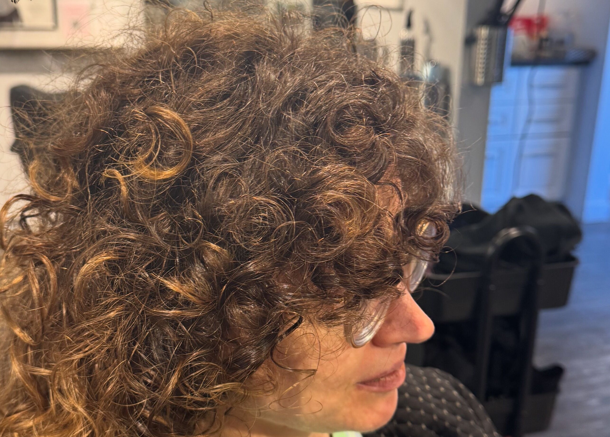 Close-up of styled curly hair at Creative Look on 83 Sherbrook Street, Winnipeg, Manitoba, CA.