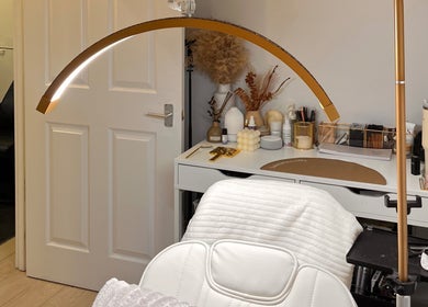 Beauty By Martyna's tranquil spa room with plush chair and modern decor in Stirling, Scotland, GB.