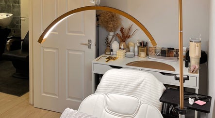 Beauty By Martyna's tranquil spa room with plush chair and modern decor in Stirling, Scotland, GB.