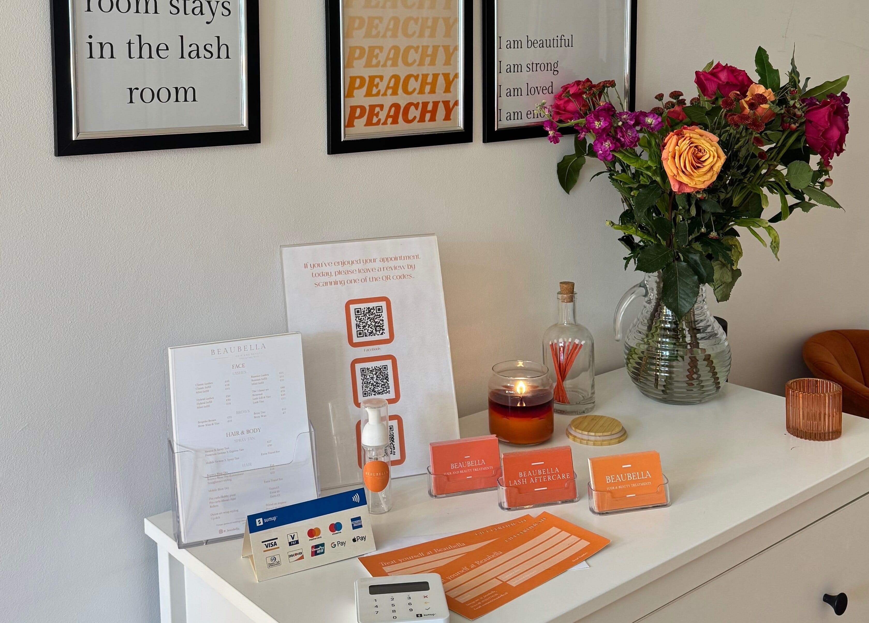 Beaubella's welcoming reception with flowers and service brochures in Bishops Stortford, England, GB.