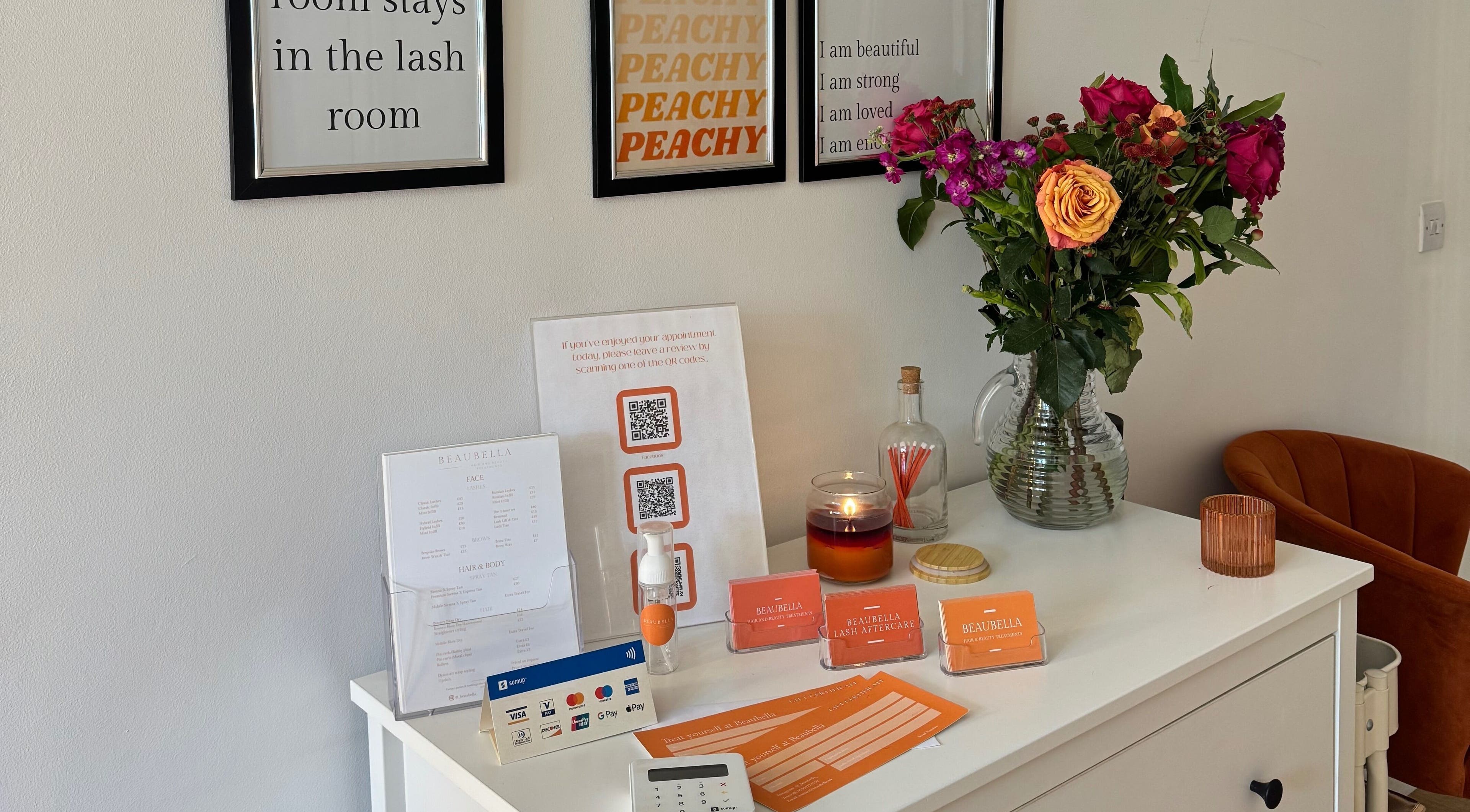 Beaubella's welcoming reception with flowers and service brochures in Bishops Stortford, England, GB.