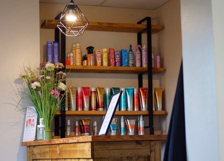 Hair products and flowers at Head Quarters Hair and Beauty Salon, Thorngumbald, England, GB.