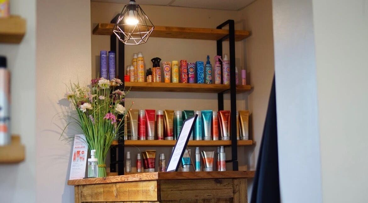 Hair products and flowers at Head Quarters Hair and Beauty Salon, Thorngumbald, England, GB.