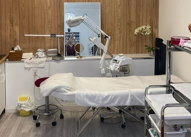 Treatment room at True Bella Nails Spa in Hacienda Heights, California, US, with a comfortable bed and calming decor.