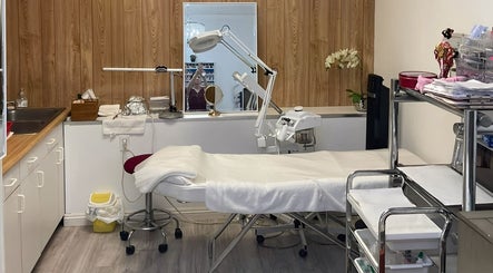 Treatment room at True Bella Nails Spa in Hacienda Heights, California, US, with a comfortable bed and calming decor.