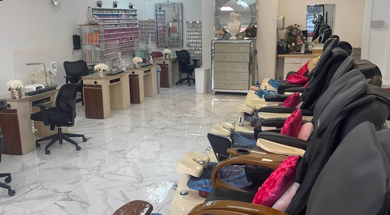 True Bella Nails Spa in Hacienda Heights, California, US. Spacious interior with nail stations and cozy pedicure chairs.