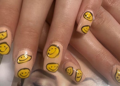 Stylish smiley face nail art at True Bella Nails Spa, Hacienda Heights, California, US.