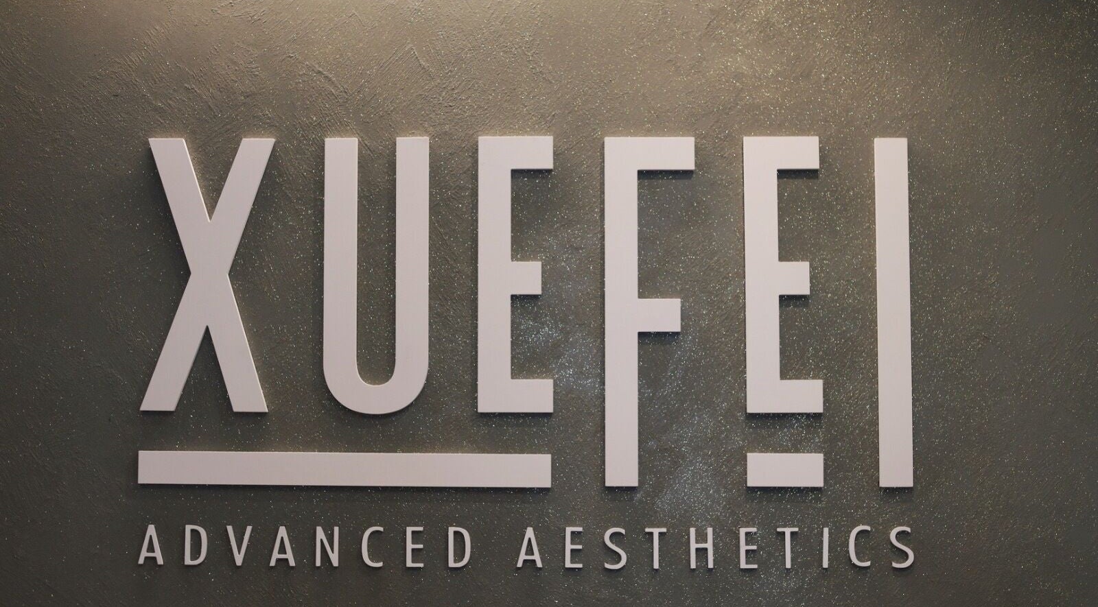Xuefei Salon logo on elegant wall at Birkirkara, MT.