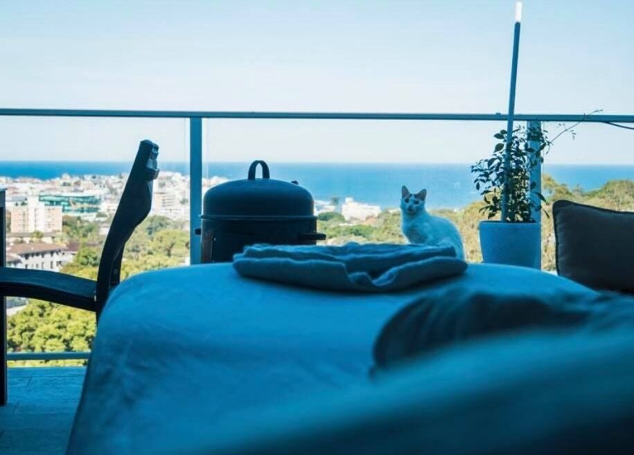 Relaxing home visit at Minty Massage in Bondi Junction, New South Wales, AU with ocean views and cozy setting.