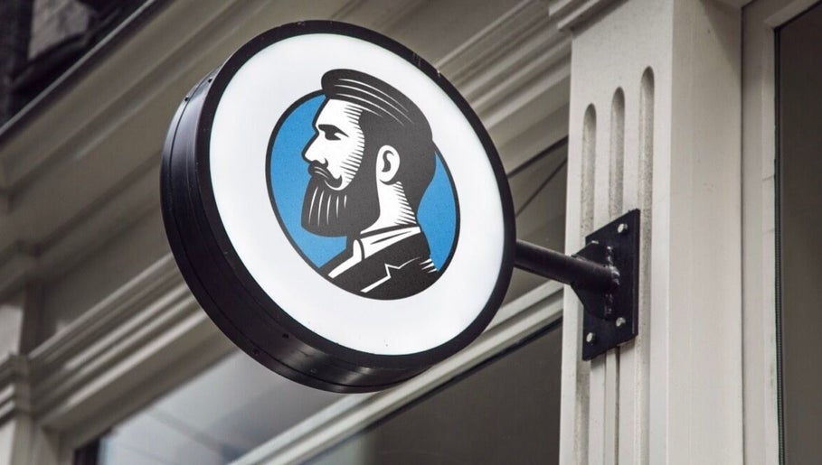 Round sign at Adam's Republic | Al-Shati, الدمام, المنطقة الشرقية, SA with vintage barber illustration.